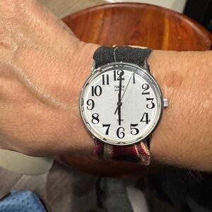 Timex black fabric snap band watch.